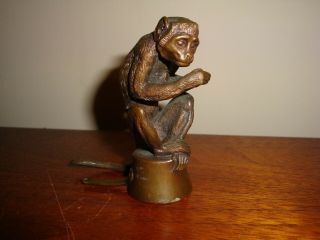 Vintage Bronze Figure Of A Monkey Sitting On Upturned Saucepan 8 Cm Tall