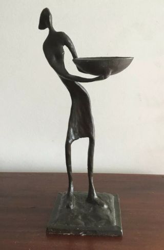 Great Iron Sculpture Of Figure Holding Bowl