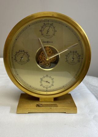 Howard Miller No.  4rg897 Brass Desk Clock W/ Skeleton Features And Weather Dials