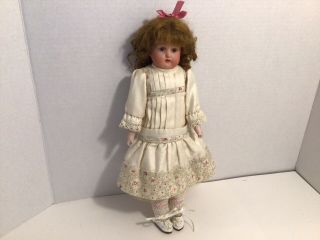 12 " Antique Bisque Head Doll - 275.  16/0