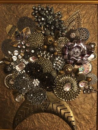 vintage jewelry art,  Christmas tree’s,  Angels,  Flower vases,  etc.  framed 2