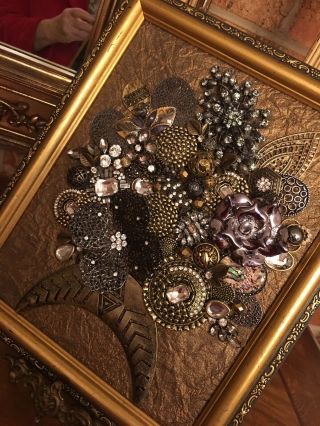 vintage jewelry art,  Christmas tree’s,  Angels,  Flower vases,  etc.  framed 3