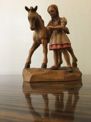 An Antique Carved Wooden Anri Of Girl With Horse 11cm H