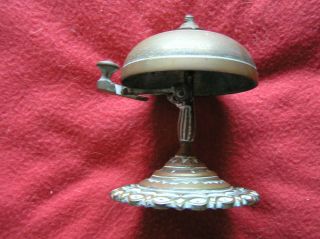 959.  Sales Counter Bell,  appears to be made of Brass,  approx.  4 in.  tall X 3 in. 2