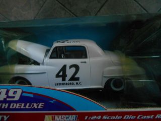 42 Lee Petty 1949 Plymouth Delux.  1999 1/24 Racing Champions.