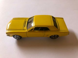 Ertl Yellow 1965 Ford Mustang,  No.  16727,  Scale 1:64,  Die Cast Metal.