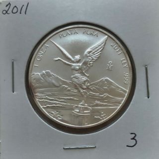 2011 Mexican Libertad 1oz.  999 Silver Coin Toning Spots