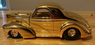 Gold Colored ￼41 Willy Racing Champions Model Hot Rod