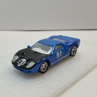 100 Hot Wheels 1/64 Scale Ford Gt - 40 W/ Real Riders - Loose