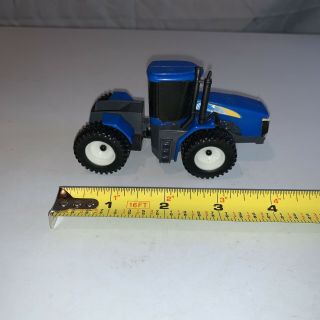 Holland Blue Ertl Tractor 4” Die Cast Collectible