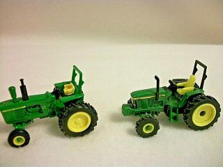 Ertl John Deere - Four 1:64 Tractors