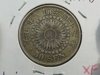 Better Grade Yr.  42 (1909) Silver 50 Sen Japan.  11