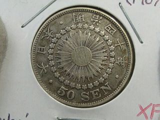 Better Grade Yr.  40 (1907) Silver 50 Sen Japan.  12