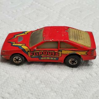 Vintage 1986 Hot Wheels Flip Outs Red Nissan 200sx Diecast Toy Car