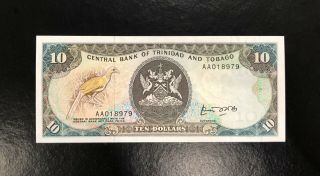 Trinidad And Tobago - 10 Dollars - 1985 - Prefix Aa - Sign.  E.  A.  Bobb - Pick 38a,  Unc.