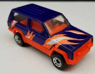 Matchbox Superfast Jeep Cherokee 1986 In Purple And Orange