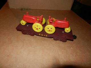 Marx Erie Flat Car W/red Tractors,  4 Wheel,