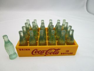 Vintage Coca Cola 24 Miniature Mini Coke Bottles With Yellow Case,  1 Bottle.