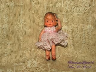 Antique Japan Bisque Girl Jointed Arms Pink Lace Dress Miniature Doll