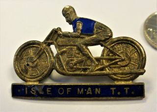 Vintage Isle Of Man Tt Badge With Motorcyclist In Metal With Blue Enamel.