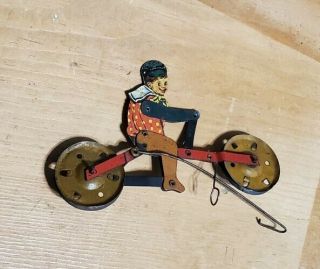Vintage Tin Litho Boy On Bike Rare