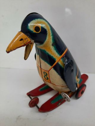 T.  M Japan Chromo Lithographed Tin Skiing Penguin Toy Japan Japanese Marx Vintage