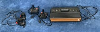 Vintage Atari 2600 Console W/original Paddles And 2 Joysticks.  Only.