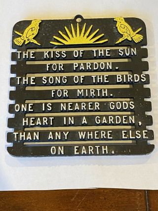 Vintage Country Cast Iron Metal Trivet " The Kiss Of The Sun For Pardon.  "
