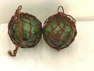 Two Nautical Vintage Rope Fishing Buoys Hand Blown Green Glass Float Ball In Net
