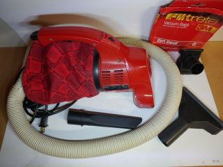 Vintage Royal Dirt Devil Hand Vac Model 103 With Hose And Attachments.