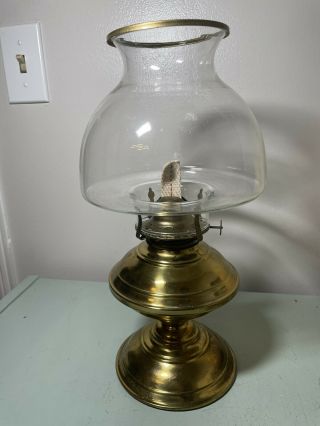 Vintage Antique Kerosine Oil Lamp With Brass Base And Clear Glass Top.